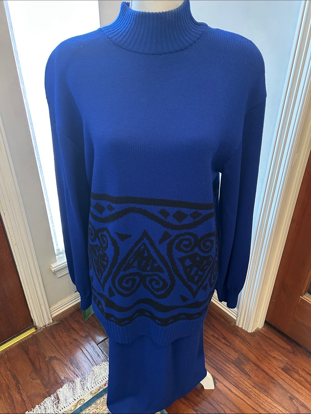 Cobalt Blue Turtleneck Sweater with Black Pattern and skirt
